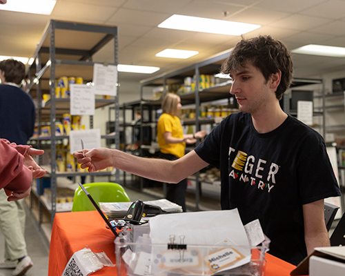 Student worker helping at Tiger Pantry