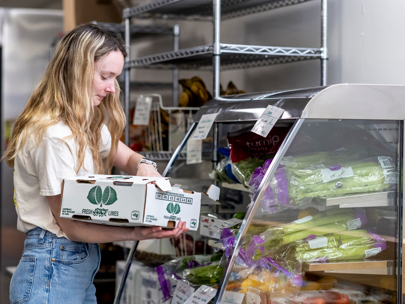 Student volunteering at Tiger Pantry.